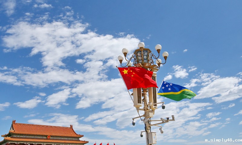 National flags of China and the Solomon Islands Photo:VCG